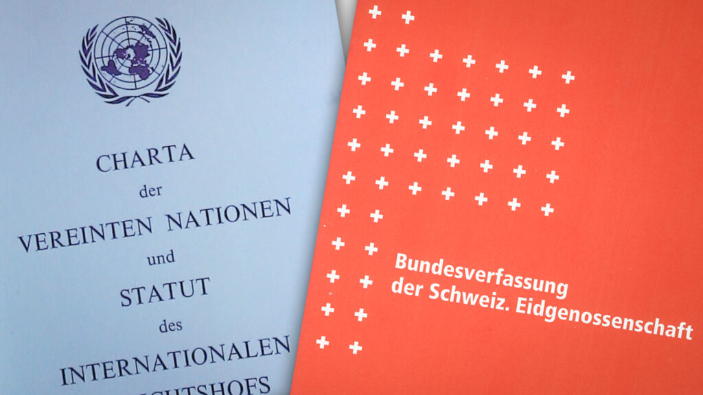 Left: United Nations Charter page with emblem and German title; right: orange Swiss constitution cover with white cross pattern.